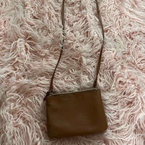 Small tan shoulder bag